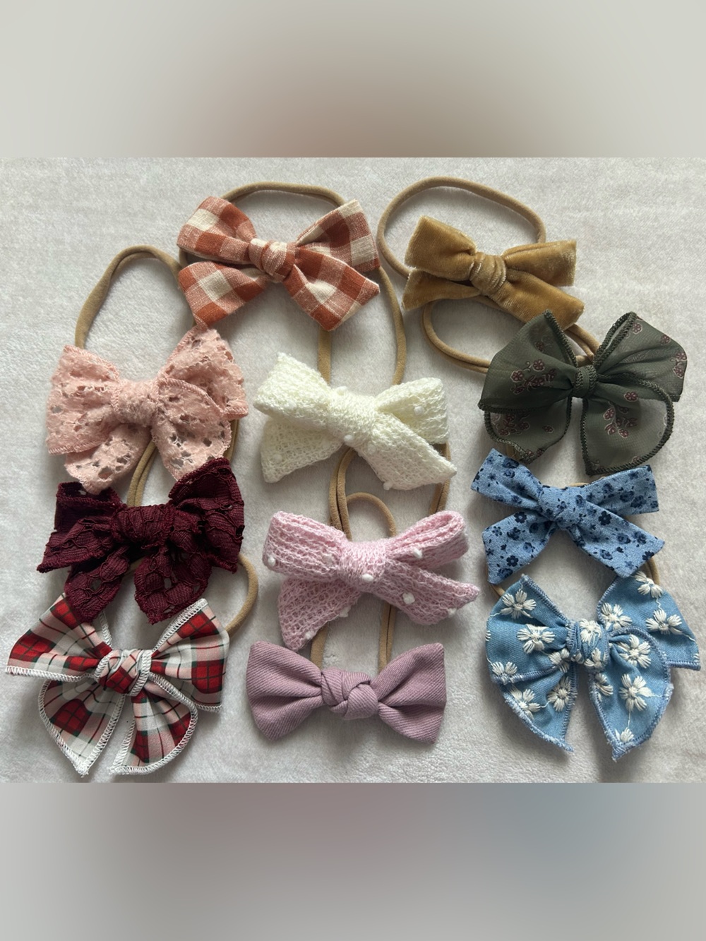 EUC Little Poppy Co set 11 bows